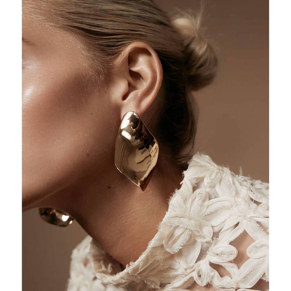 NEW SHASHI twisted statement earrings in gold